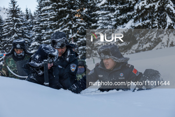 Border police are patrolling the border in heavy snow at -33 degrees Celsius in Altay, Xinjiang Province, China, on February 20, 2024. 