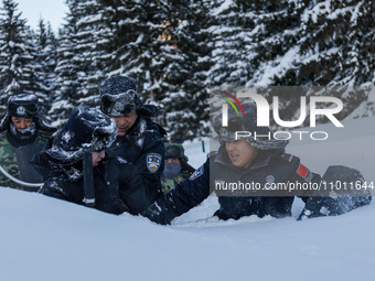 Border police are patrolling the border in heavy snow at -33 degrees Celsius in Altay, Xinjiang Province, China, on February 20, 2024. (