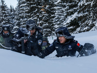 Border police are patrolling the border in heavy snow at -33 degrees Celsius in Altay, Xinjiang Province, China, on February 20, 2024. (