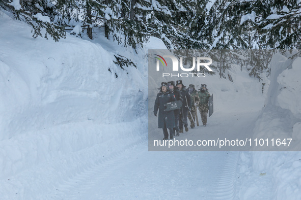 Border police are patrolling the border in heavy snow at -33 degrees Celsius in Altay, Xinjiang Province, China, on February 20, 2024. 