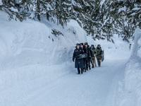 Border police are patrolling the border in heavy snow at -33 degrees Celsius in Altay, Xinjiang Province, China, on February 20, 2024. (