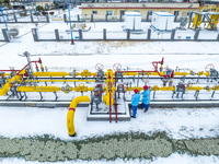 Workers are conducting a safety inspection of gas facilities and equipment at the Gas Gate station in Donghai County, Lianyungang city, East...