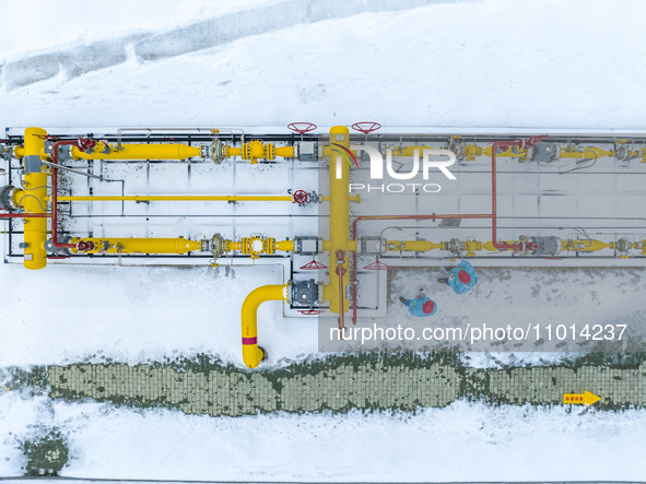 Workers are conducting a safety inspection of gas facilities and equipment at the Gas Gate station in Donghai County, Lianyungang city, East...