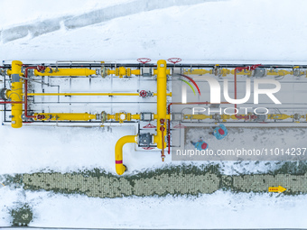 Workers are conducting a safety inspection of gas facilities and equipment at the Gas Gate station in Donghai County, Lianyungang city, East...