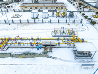 Workers are conducting a safety inspection of gas facilities and equipment at the Gas Gate station in Donghai County, Lianyungang city, East...