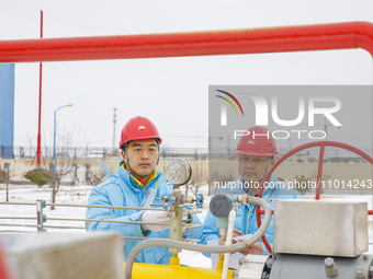 Workers are conducting a safety inspection of gas facilities and equipment at the Gas Gate station in Donghai County, Lianyungang city, East...