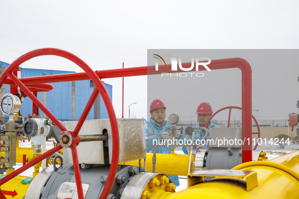 Workers are conducting a safety inspection of gas facilities and equipment at the Gas Gate station in Donghai County, Lianyungang city, East...