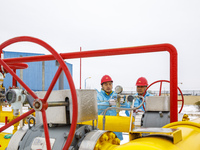 Workers are conducting a safety inspection of gas facilities and equipment at the Gas Gate station in Donghai County, Lianyungang city, East...