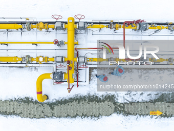 Workers are conducting a safety inspection of gas facilities and equipment at the Gas Gate station in Donghai County, Lianyungang city, East...