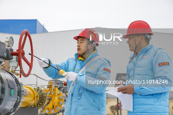 Workers are conducting a safety inspection of gas facilities and equipment at the Gas Gate station in Donghai County, Lianyungang city, East...