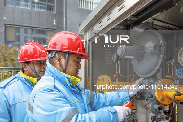 Workers are conducting a safety inspection of gas facilities and equipment at the Gas Gate station in Donghai County, Lianyungang city, East...