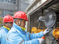 Workers are conducting a safety inspection of gas facilities and equipment at the Gas Gate station in Donghai County, Lianyungang city, East...