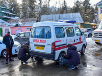 People are preparing an ambulance after an avalanche hit the Ski resort in Gulmarg, Baramulla District, Indian Administered Kashmir, on Febr...