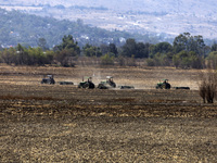 A farmer is plowing the land on a tractor in the affected area of the Zumpango lagoon, which is experiencing drought due to the lack of rain...