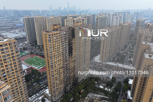 An aerial photo is showing the scene after a fire was extinguished in a residential area in Nanjing, Jiangsu Province, China, on February 23...