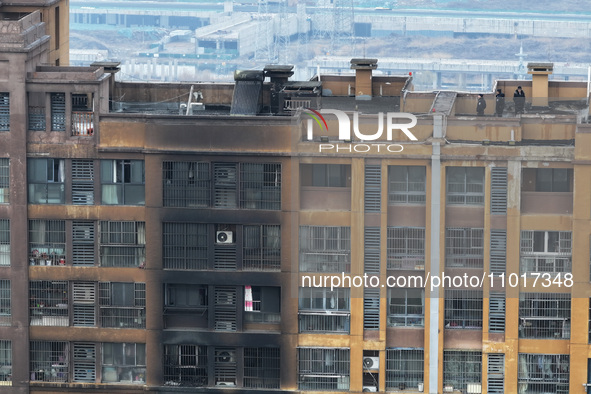 An aerial photo is showing the scene after a fire was extinguished in a residential area in Nanjing, Jiangsu Province, China, on February 23...