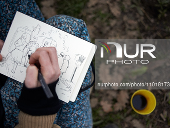 A young woman is drawing a scene near the 'Crem'Arbre' ZAD, where people are being blocked by the Gendarmerie Mobile. Michel Forst, the Unit...