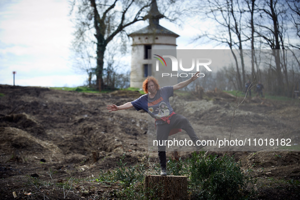 A protester is standing on the stump of a tree that was cut two days ago. Michel Forst, the United Nations Special Rapporteur on the situati...