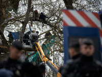 Police officers from the CNAMo are arresting an 'Ecureuil' in very dangerous conditions while Michel Forst is present. Michel Forst, the Uni...