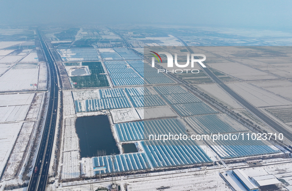 An aerial photo is showing a green vegetable planting base in Guiren Township, Suqian City, Jiangsu Province, East China, on February 25, 20...