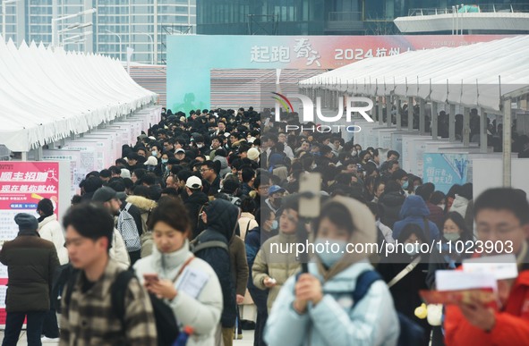 Job seekers are looking for new opportunities at the 2024 Talent Exchange Conference in Hangzhou, Zhejiang Province, China, on February 25,...