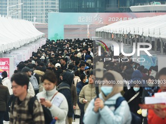 Job seekers are looking for new opportunities at the 2024 Talent Exchange Conference in Hangzhou, Zhejiang Province, China, on February 25,...