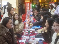 Job seekers are consulting at a large-scale job fair in Taizhou, East China's Jiangsu Province, on February 25, 2024. (