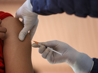 A Nepali paramedic is administering a vaccine against measles-rubella at a local school in Kathmandu, Nepal, on February 25, 2024. Nepal lau...