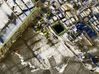 Workers are working at the construction site of Mixheng City in Huai'an, China, on February 25, 2024. (