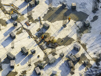 Workers are working at the construction site of Mixheng City in Huai'an, China, on February 25, 2024. (