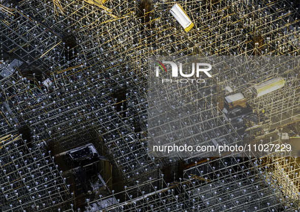 Workers are working at the construction site of Mixheng City in Huai'an, China, on February 25, 2024. 