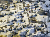 Workers are working at the construction site of Mixheng City in Huai'an, China, on February 25, 2024. (