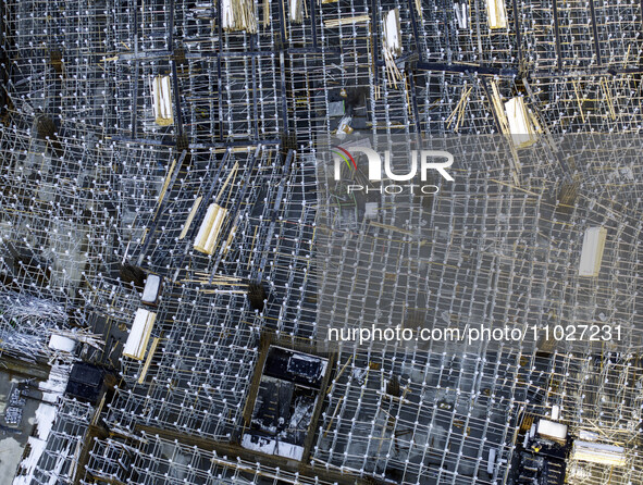 Workers are working at the construction site of Mixheng City in Huai'an, China, on February 25, 2024. 