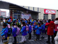 Primary school students are lining up to enter the campus at the start of the new semester in Yichang, Hubei Province, China, on February 26...