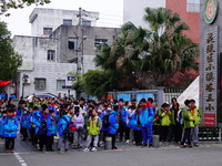 Primary school students are lining up to enter the campus at the start of the new semester in Yichang, Hubei Province, China, on February 26...