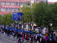 Primary school students are lining up to enter the campus at the start of the new semester in Yichang, Hubei Province, China, on February 26...