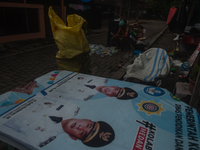 Plastic waste scavengers are collecting debris in the Babura River, which is polluted by plastic waste, in Medan, North Sumatra, Indonesia,...