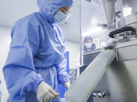 A college student is participating in a pharmaceutical production competition in Huai'an, China, on February 27, 2024. (