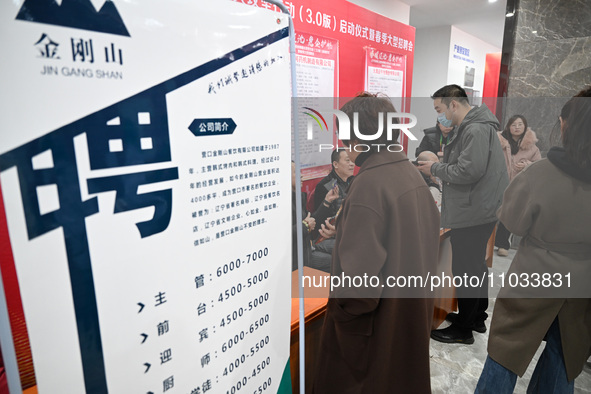 A large number of job seekers are attending a spring job fair in Shenyang, Liaoning Province, China, on February 28, 2024. 