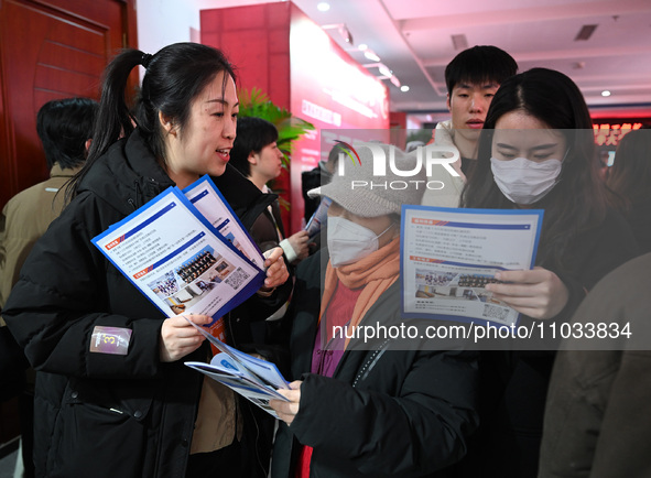 A large number of job seekers are attending a spring job fair in Shenyang, Liaoning Province, China, on February 28, 2024. 