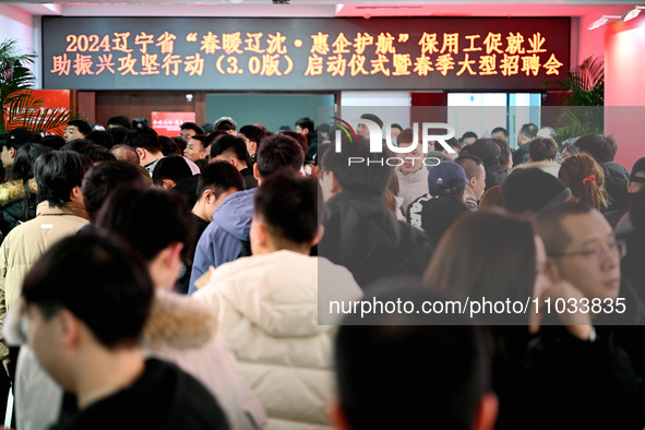 A large number of job seekers are attending a spring job fair in Shenyang, Liaoning Province, China, on February 28, 2024. 