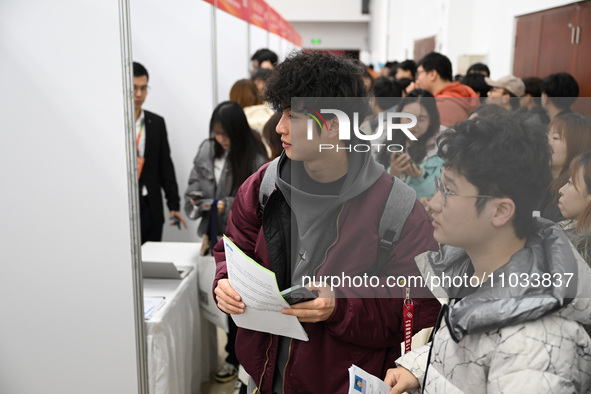 A large number of job seekers are attending a spring job fair in Shenyang, Liaoning Province, China, on February 28, 2024. 