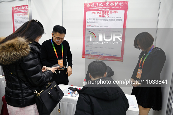 A large number of job seekers are attending a spring job fair in Shenyang, Liaoning Province, China, on February 28, 2024. 