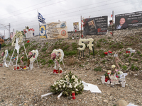 Flowers are forming the number 57, representing the number of individuals who died in the train crash, in Tempi Thessaly, Greece, on on Febr...