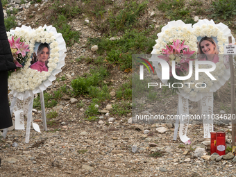 Wreaths of heart-shaped flowers are being laid for the twin sisters who were killed in the train crash, in Tempi Thessaly, Greece, on on Feb...