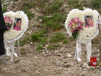 Wreaths of heart-shaped flowers are being laid for the twin sisters who were killed in the train crash, in Tempi Thessaly, Greece, on on Feb...