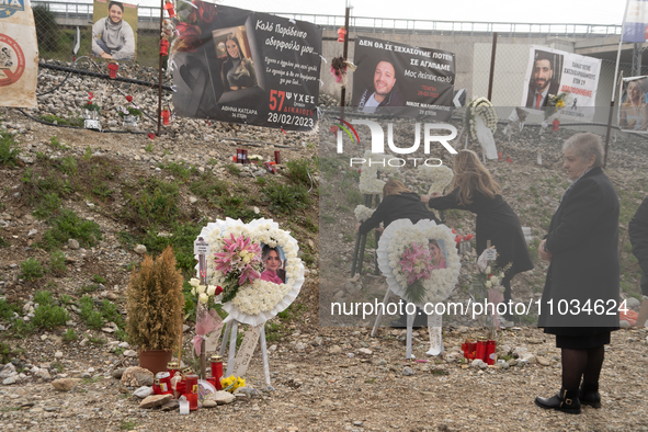 Relatives are leaving flowers and wreaths with the number 57 to honor those killed in the train accident, in Tempi Thessaly, Greece, on on F...