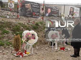 Relatives are leaving flowers and wreaths with the number 57 to honor those killed in the train accident, in Tempi Thessaly, Greece, on on F...