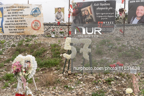 Flowers are forming the number 57, representing the number of individuals who died in the accident, in Tempi Thessaly, Greece, on on Februar...