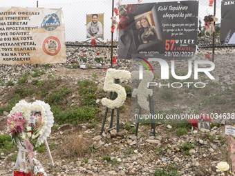 Flowers are forming the number 57, representing the number of individuals who died in the accident, in Tempi Thessaly, Greece, on on Februar...